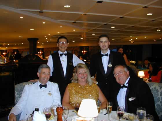 Ed & Marilyn with Staff Captain, Asst Waiter & Waiter